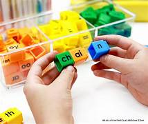 Child building words with colorful letter cubes — multisensory phonics and structured literacy intervention for dyslexia